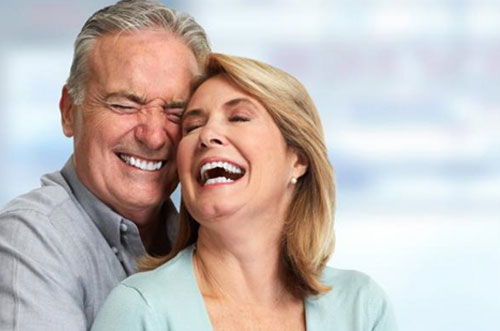 Old Couple Laughing with dentures